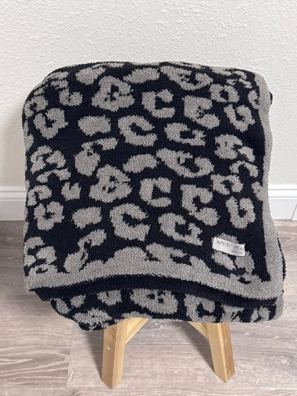 Barefoot Dreams CozyChic Barefoot in the Wild Throw Blanket in Charcoal Leopard
